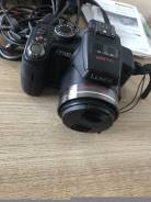 Panasonic Lumix DMC-FZ100. 10 - 14.9 Мп, зум: 14х и более