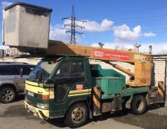 Isuzu Elf. Автовышка, 3 600 куб. см., 15 м.