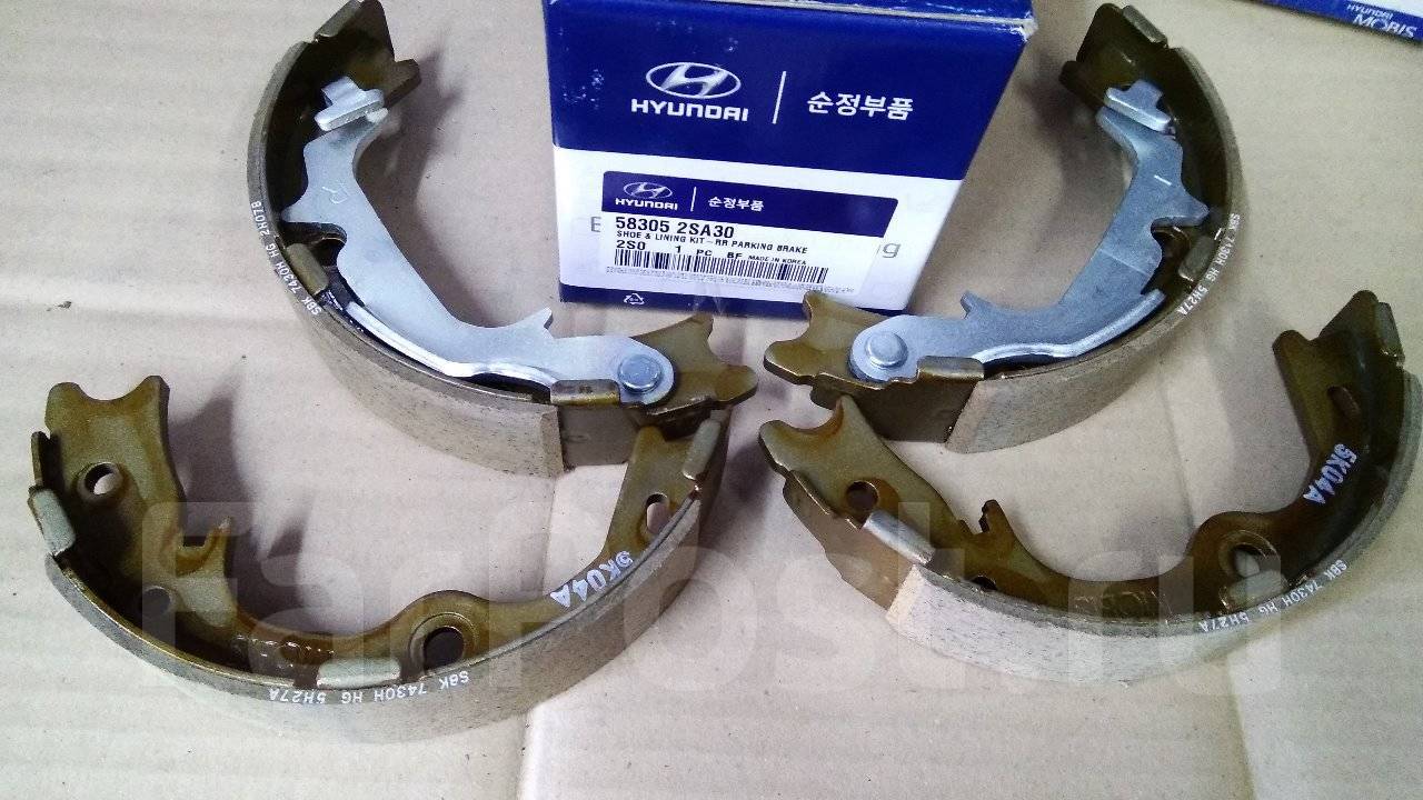 Колодки ручного тормоза. 58305-2sa30. Hyundai/Kia 58305-2sa30 колодки тормозные барабанные. Колодки ручника Киа Спортейдж 3 58305-2sa30. Колодки ручного тормоза Kia Sportage 3.