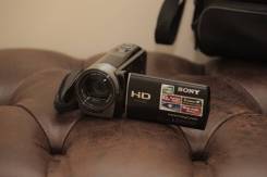 Sony HDR-CX130E. Менее 4-х Мп, с объективом