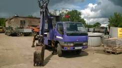Isuzu Elf. Автоэкскаватор Mitsubishi Canter, 4 200 куб. см., 0,25 куб. м.