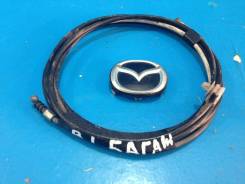 Тросик багажника. Mazda Protege Mazda Familia, BJ3P, BJ5P, BJ5W, BJ8W, BJEP, BJFP, BJFW Mazda 323 Двигатели: ZL, ZLDE, ZLVE