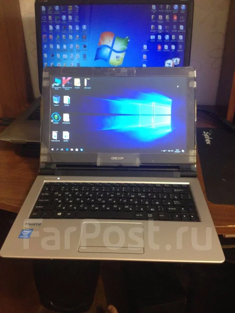 DEXP Athena. 11.6", 1,6����, ��� 2048 ��, ���� 500���, WiFi: 1, Bluetooth: 1, ����������� �� 10��. ����