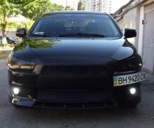 Эмблема решетки. Mitsubishi Lancer X