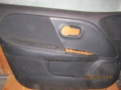 Обшивка двери. Nissan Note