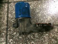 Крепление масляного фильтра. Mitsubishi Eclipse, D39A Mitsubishi RVR, N13W, N14W, N23W, N23WG, N24W Mitsubishi Chariot, N33W, N34W, N43W, N44W Mitsubi...