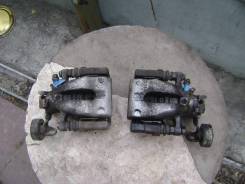 Суппорт тормозной. Opel Astra GTC Opel Meriva Opel Zafira Subaru Traviq