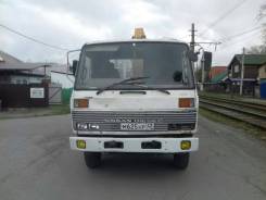 Nissan Diesel. Кран-манипулятор ., 7 000 куб. см., 5 000 кг., 12 м.