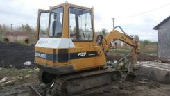 Komatsu. Экскаватор