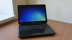 Asus K40AF. 14", 2 100,0����, ��� 2048 ��, ���� 250���, WiFi