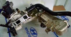 Корпус термостата. Hyundai ix35 Hyundai Santa Fe Hyundai Tucson Kia Sportage Kia Carnival Kia Sorento