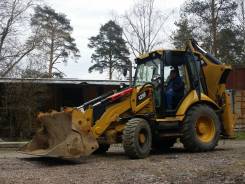 Caterpillar. 428F.12г. - Экскаватор-погрузчик., 1,10 куб. м.