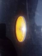 Поворотник. Nissan March, K11