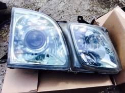Фара. Toyota Land Cruiser Cygnus, UZJ100W Lexus LX470, UZJ100
