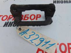 Скоба суппорта заднего правого Nissan Tiida (C11)