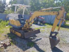 Komatsu PC10. 1988 г., 1 500 куб. см., 0,35 куб. м.