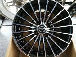 Mazda. 6.0x15, 4x100.00, ET40, ЦО 67,1 мм.