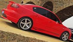Клык бампера. Mazda Axela