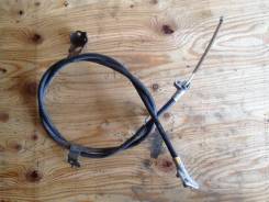 Тросик ручного тормоза. Toyota Platz, NCP12, SCP11 Toyota Vitz, NCP10, NCP13, SCP10 Двигатели: 1NZFE, 1SZFE, 2NZFE