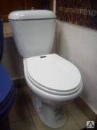 Унитазы.