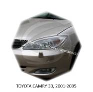 Накладка на фару. Toyota Camry