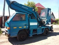 Isuzu Elf. Продам экскаватор-гидромолот Isuzu ELF, 3 600 куб. см., 0,10 куб. м.