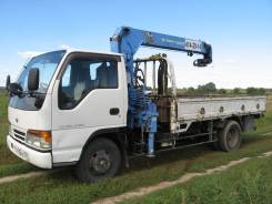 Nissan Atlas. Продаётся манипулятор (Isuzu Elf), 4 300 куб. см., 3 000 кг.