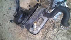 Радиатор масляный. Audi A6 allroad quattro Audi A4, B5 Audi A6 Audi S6 Volkswagen Passat