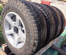 Комплект колес на Шевроле НИВА Toyo Open Country 205/70 R15 на дисках. 6.5x15 5x139.70 ET40 ЦО 98,0 мм.