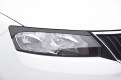 Накладка на фару. Skoda Rapid