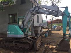 Komatsu PC75UU. , 0,35 куб. м.