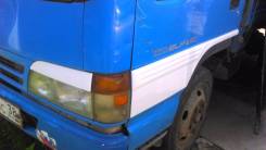 Накладка на фару. Isuzu Elf