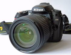 Nikon D90 Kit. 10 - 14.9 Мп, зум: 5х