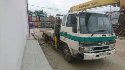 Isuzu Forward. Самогруз , 7 127 куб. см., 3 000 кг.