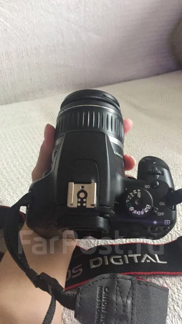 Canon EOS 1000D ����