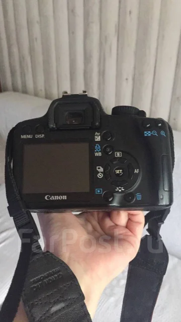 Canon EOS 1000D ����