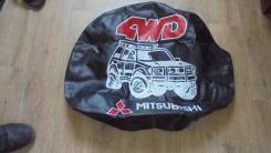 Чехол для запасного колеса. Mitsubishi: Lancer Cedia, Airtrek, Pajero iO, Pajero Pinin, RVR, Lancer Двигатели: 4G94, 4G93