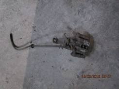 Суппорт тормозной. Nissan Almera, N16
