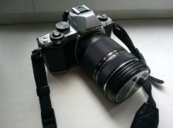 Olympus OM-D E-M10 Kit. 15 - 19.9 Мп, зум: 14х и более