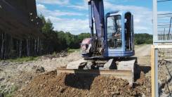 Komatsu PC128UU. Komatsu 128 uu, 4 000 куб. см., 0,50 куб. м.