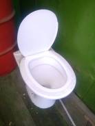 Унитазы.