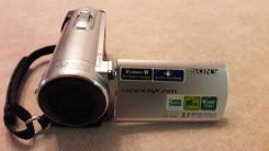 Sony DCR-SX83E. Менее 4-х Мп, с объективом