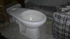 Унитазы.