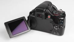 Canon PowerShot SX30 IS. 10 - 14.9 Мп, зум: 14х и более