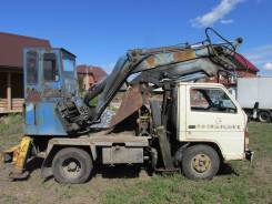 Isuzu Elf. Продам автоэкскаватор Isuzu ELF, 3 300 куб. см., 0,25 куб. м.