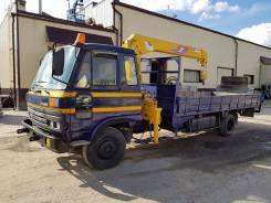 Nissan Diesel. Манипулятор , 7 000 куб. см., 5 000 кг., 9 м.