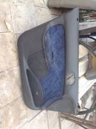 Обшивка двери. Peugeot 206