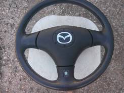 Руль. Mazda
