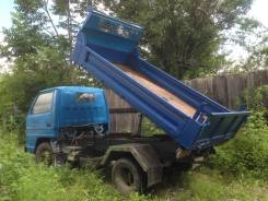 Isuzu Elf. 1984г - самосвал, 3 500 куб. см., 2 000 кг.