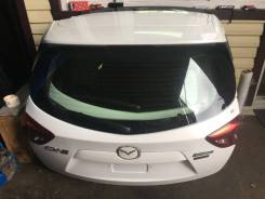 Крышка багажника. Mazda